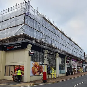 a large building with scaffolding on top of it